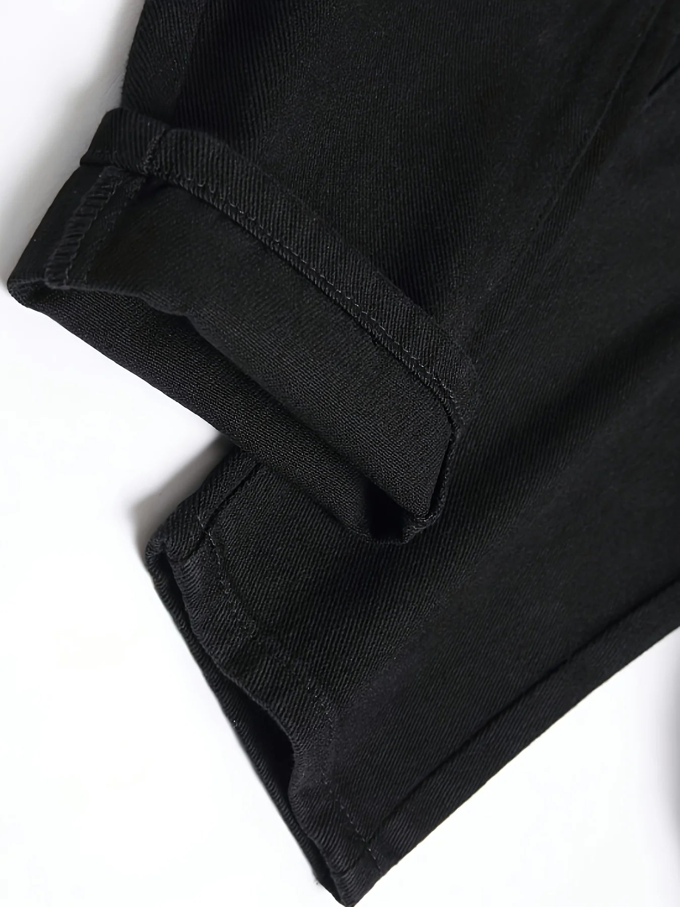 Men's slim fit perforated black denim pants